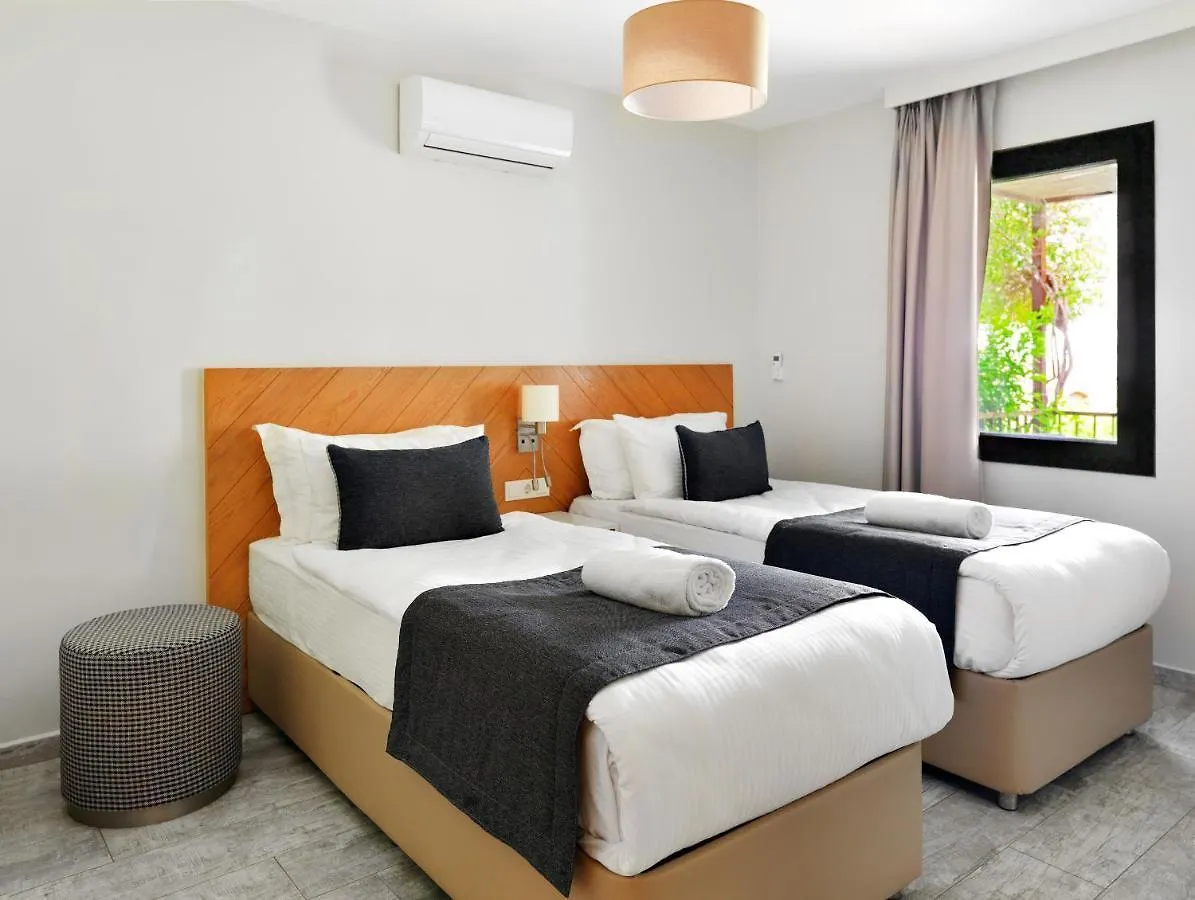 Отель Dorman Suites Битез